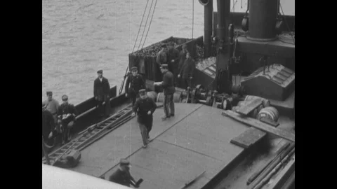 French soldiers inspect a car and boat on the canal, Germany Stock Footage 109546953