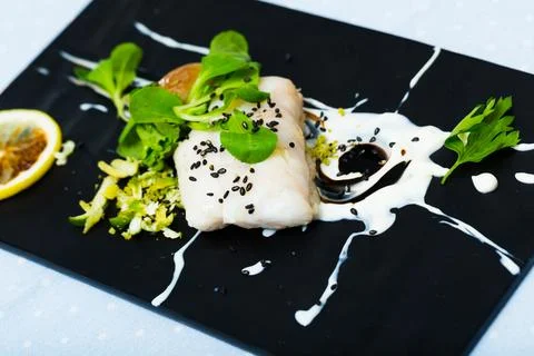 French-style cod with vegetables Stock Photos