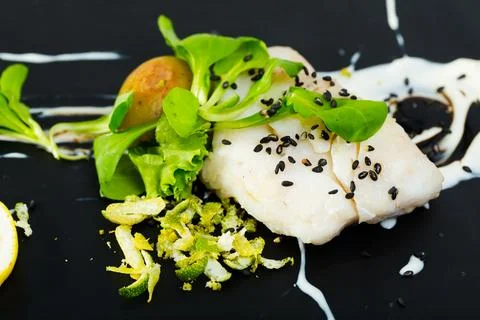 French-style cod with vegetables Stock Photos