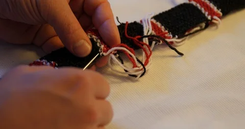 French Tailor making hand made knitted tie. Stock Footage 120041258