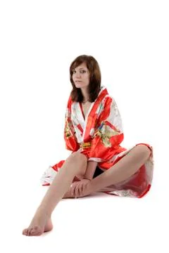French young girl geisha in red silk kimono Stock Photos