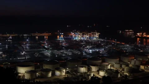 Frenetic Activity: Aerial Drone View of Bustling Industrial Port in Barcelona Stock Footage 252599314
