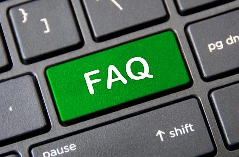 Frequently ask question concept - Laptop keyboard with green FAQ button. Stock Photos