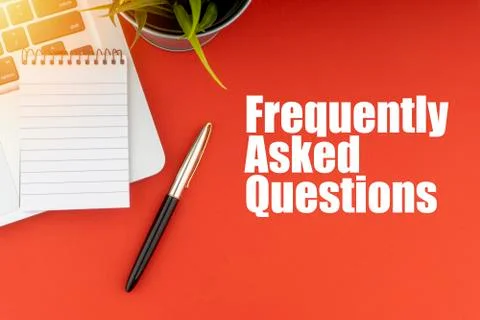 FREQUENTLY ASK QUESTIONS or FAQ text with notepad, laptop, fountain pen and d Stock Photos