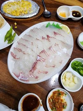 Fresh and delicate gwang-eo hoe (flatfish sashimi) with a clean, tender tex.. Stock Photos