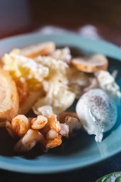 Fresh and delicious caesar shrimp salad with lettuce and crusty crouton toasts Stock Photos