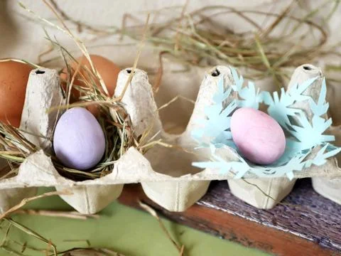 Fresh and Easter painted chicken and quail eggs Stock Photos