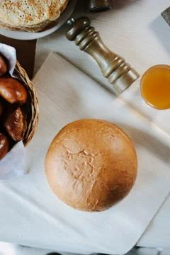 Fresh and hot bread on table Stock Photos