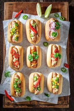Fresh and tasty mini hot dogs as quick appetizers. Stock Photos