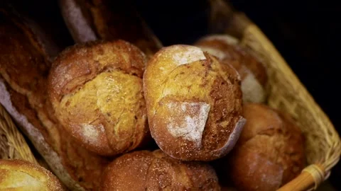 Fresh appetizing bread lies in a wicker basket Stock Footage 145711282