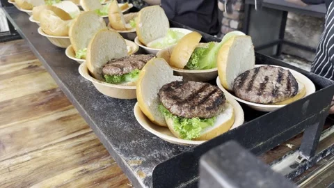 Fresh, appetizing bun with meat cutlet with lettuce. Stock-Footage 245339951