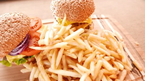 Fresh appetizing hamburgers with a fried potatoes Stock Footage 74169774