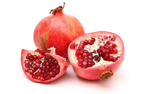 Fresh appetizing pomegranates Stock Photos