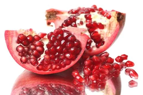 Fresh appetizing pomegranates Stock Photos