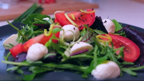 Fresh appetizing salad and mozzarella tomatoes. Stock Footage 154241876