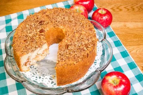Fresh apple cake with slice missing Stock Photos