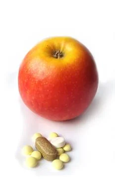 Fresh apple fruit or tablets 스톡 사진