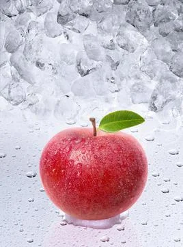 Fresh apple on ice cubes background Stock Photos