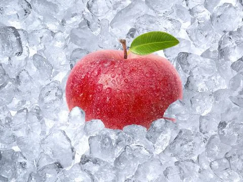 Fresh apple on ice cubes background Stock Photos