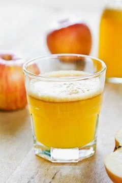 Fresh apple juice Stock Photos