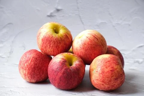 Fresh Apple lining up with white background Stock Photos