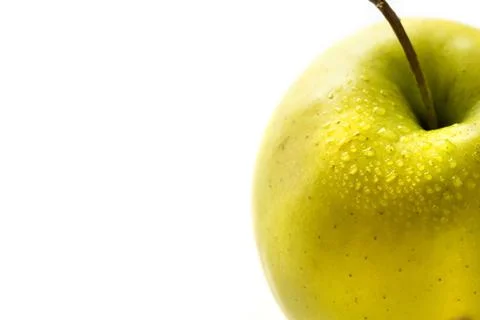 Fresh apple on the side, isolated on white Stock Photos