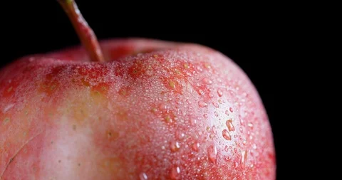 Fresh apple with water drops spin Stock Footage 129307970