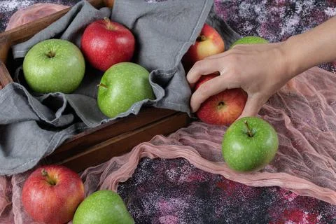 Fresh apples in a rustic wooden container Stock Photos