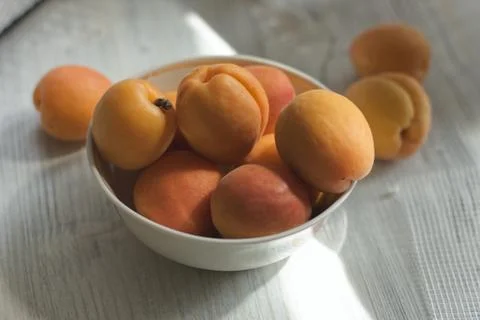 Fresh apricots on a table Stock Photos