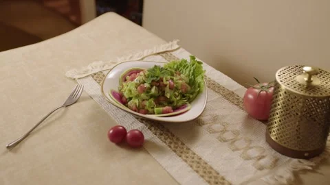 Fresh arabic salad with vegetables served on an elegant dining table for dinner Stock Footage 345146203