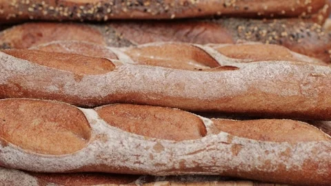 Fresh Artezan bread close-up. Artisan bread is making by skill bakers using Stock Footage 270484634