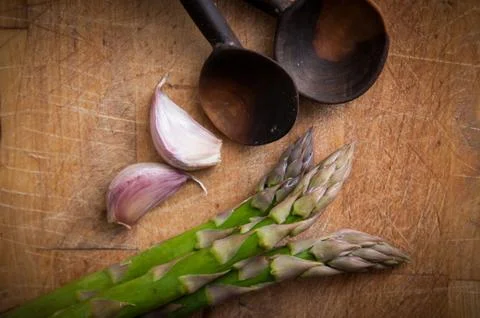 Fresh Asparagus on a rustic style background Stock Photos