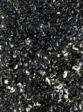 Fresh asphalt with glitter. Abstract pattern sequins. Stock Photos