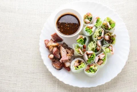 Fresh assorted Asian spring rolls with grilled pork, fresh vegetable. Healthy Stock Photos