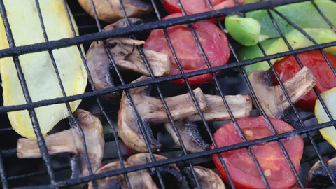 Fresh assorted vegetables are baked in the grill Stock Footage 119907071
