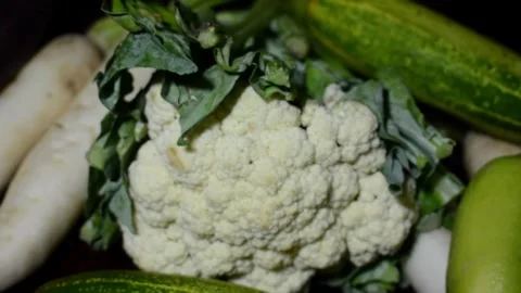 Fresh Assorted Vegetables including Cauliflower, Eggplants, Radishes 库存影片 347509448