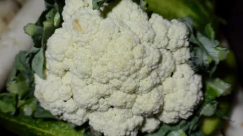 Fresh Assorted Vegetables including Cauliflower, Eggplants, Radishes, and Cu 库存影片 347510264