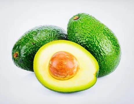 Fresh Avocado Isolated on White Background, Green Fruit Vegetable Rich in H.. Stock Photos