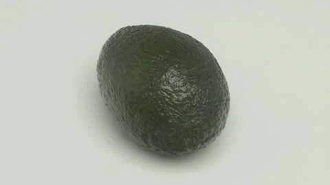 Fresh Avocado Resting on a Light Background that Enhances Its Natural Beauty and Видео 281931113
