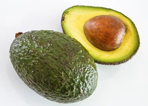 Fresh avocado on white background. Selective focus Stock Photos