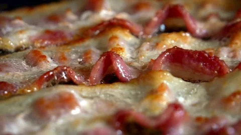 Fresh Bacon slices being cooked in a frying pan. Bacon strips sizzling. 스톡 동영상 334641553