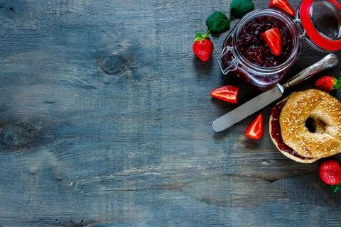 Fresh bagel with jam Stock Photos
