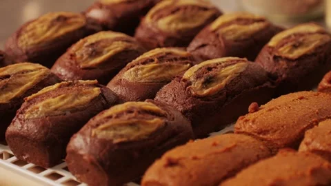 Fresh bake double chocolate banana artesian bread in bakery shop close-up Stock Footage 266830861