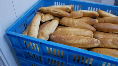 Fresh Baked Bread in Blue Container for Delivery - 4K Stock Footage 51329054