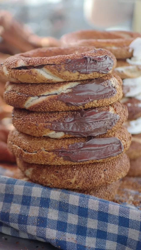 Fresh baked bread with chocolate spread on the table Stock Footage 336881612