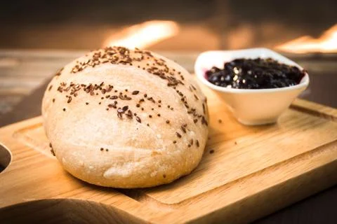 Fresh baked bread with Fruit jam on wooden background 스톡 사진