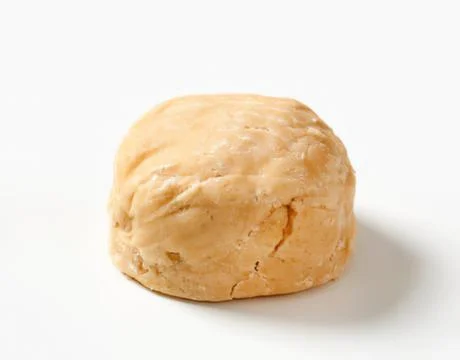 Fresh baked bread roll on plain surface Stock Photos