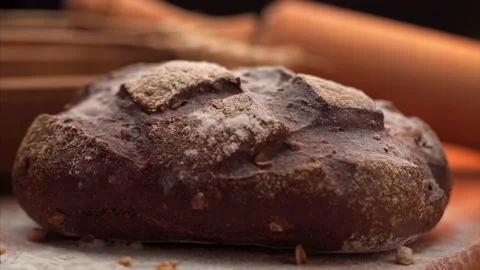 A Fresh baked bread is sprinkle with flour Stock Footage 138982248