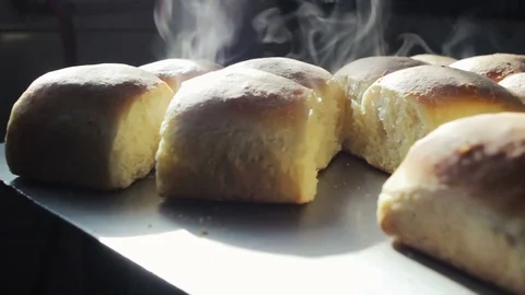 Fresh baked buns at bakery Stock Footage 73693193