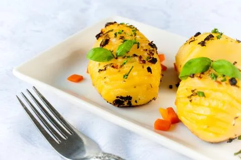 Fresh baked potatoes Stock Photos